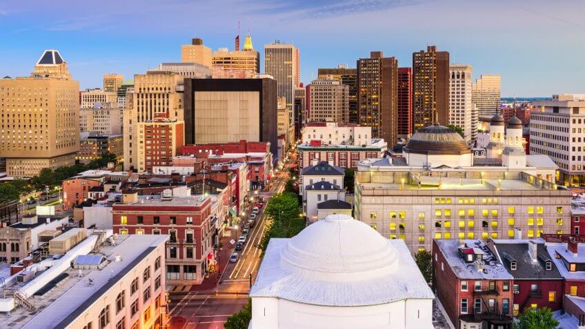 Baltimore, Maryland, USA downtown cityscape at dusk.