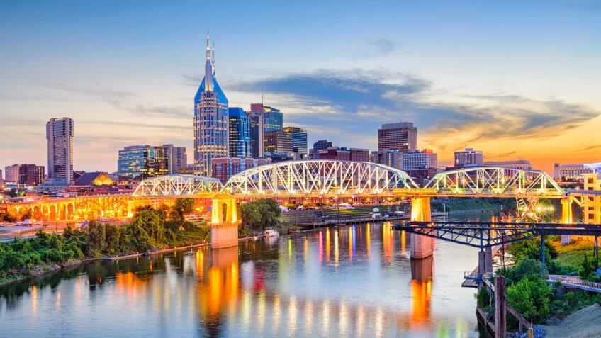 Nashville, Tennessee, USA downtown skyline on the Cumberland River.