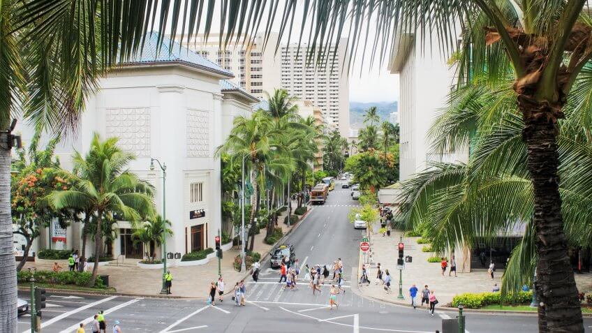 Honolulu, Hawaii, USA - May 30, 2016: Downtown Waikiki, bustling with locals and tourists.