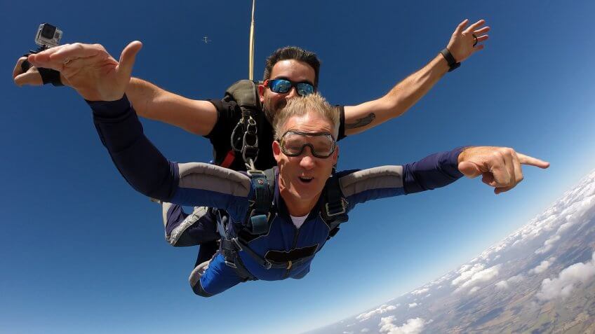 retired man skydiving