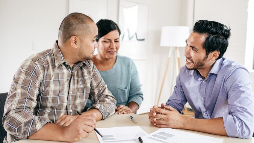 Couple and financial advisor.