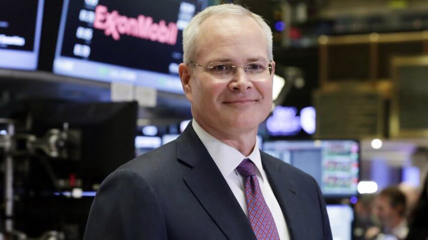 Mandatory Credit: Photo by Richard Drew/AP/REX/Shutterstock (8450730a)Exxon Mobil Corporation Chairman & CEO Darren Woods poses for a photo on the floor of the New York Stock Exchange, .