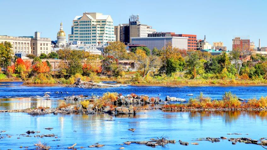 The New Jersey State House and Trenton skyline along the Delaware River is located in Trenton and is the house of government for the U.