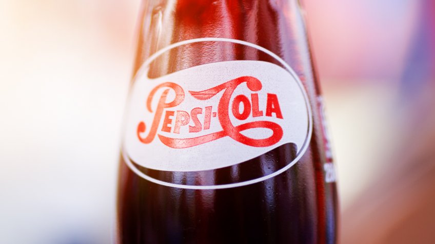 Z?rne?ti, Bra?ov, Romania - May 24, 2015: An isolated bottle of Pepsi Cola which is distributed by PepsiCo, Inc.