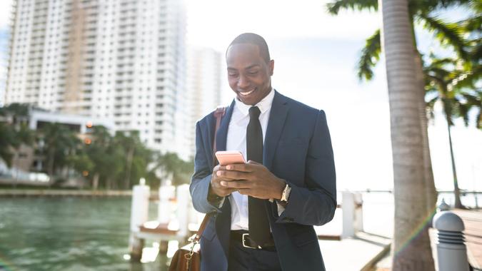 businessman texting in miami.
