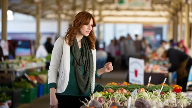 A woman shopping at a farmers market