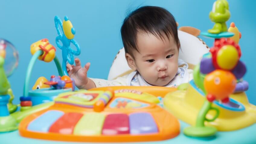 Baby playing with a toy