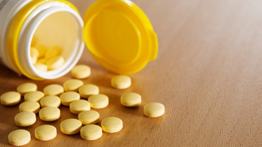 Pills and plastic bottle