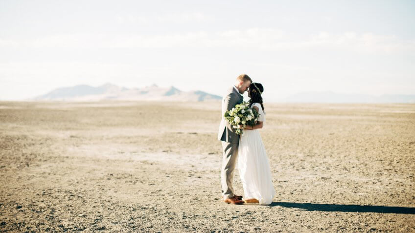 Bride and groom in Salt Lake City, Utah desert.