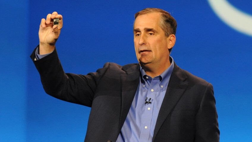 In this photo released by Intel Corporation, Brian Krzanich, Intel's Chief Executive Officer, unveils Intel® Edison, a new Intel® Quark technology-based computer housed in an SD card with built-in wireless during his keynote speech prior to opening of 2014 International CES (Consumer Electronics Show), Monday, January 6, 2014 in Las Vegas.