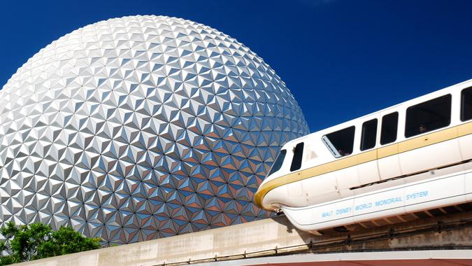 Monorail passing in front of Spaceship Earth at Epcot Center in Walt Disney World