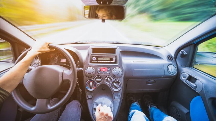a person driving a fast car