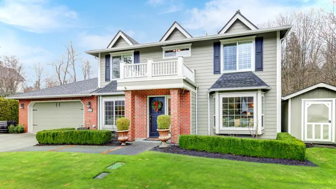 Lovely pale green Colonial home