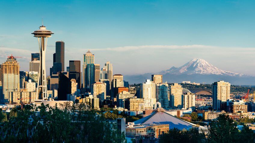 Seattle Skyline and Mount Rainier at Sunset on a clear summer day.