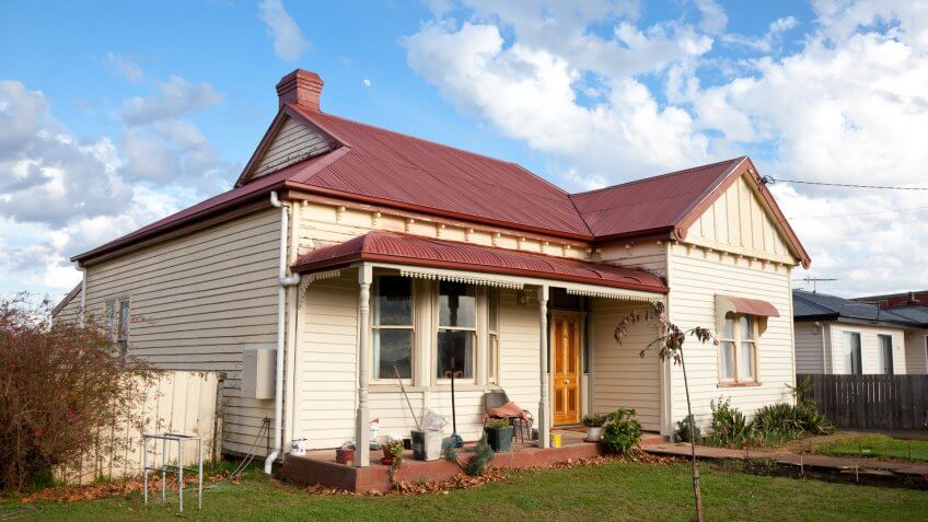 Real Estate, Architecture And Buildings, Australia, Blue, Building Exterior, Bungalow, Cloud, Colonial Style, Cottage, Homes", House, Messy, Nobody, Old, Old-fashioned, Outdoors, Roof, Run-Down, Rustic, Side View, Sky, Small, Suburb, Tasmania, Tin, repairing