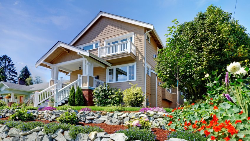 Two story beige nice house