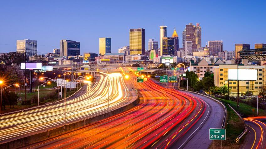 Atlanta, Georgia, USA downtown city skyline over the interstate highway.