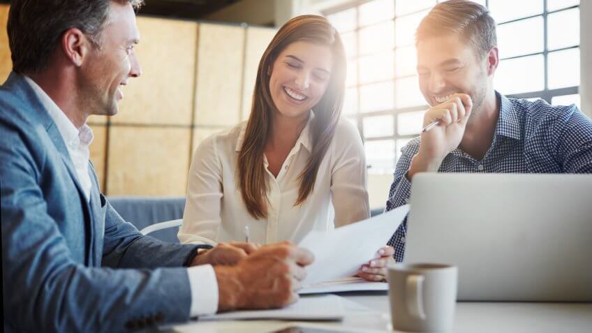 three business people working