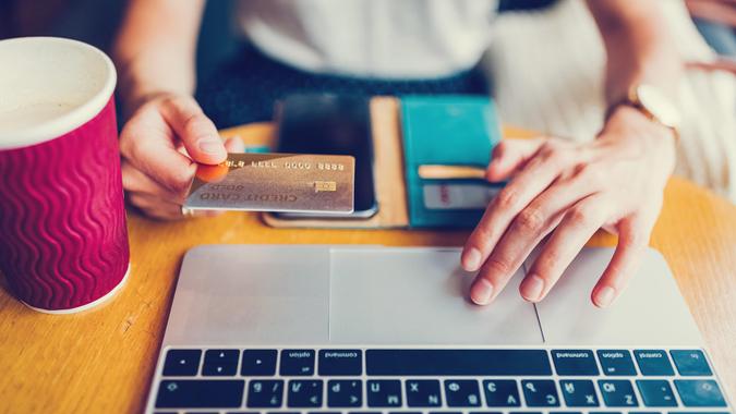 Businesswoman making online payments ++++ Note for the inspector: Credit is fake and is made especially for the photosession ++++.