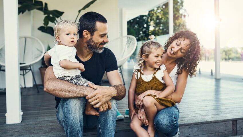 Shot of a happy young family spending the weekend together at home.