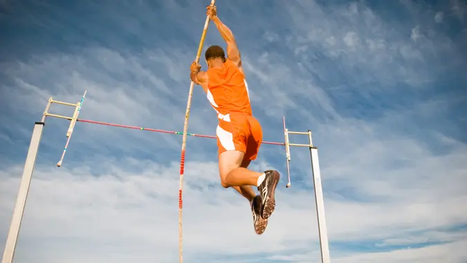 man Pole vaulting