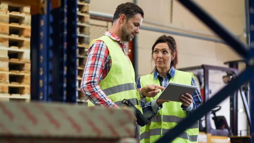 Two warehouse workers