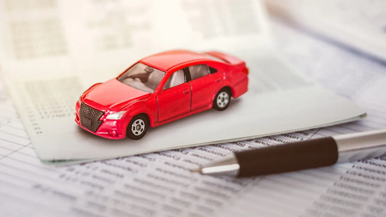 Finance, auto loan, car, car expenses, checkbook, refinance, toy car