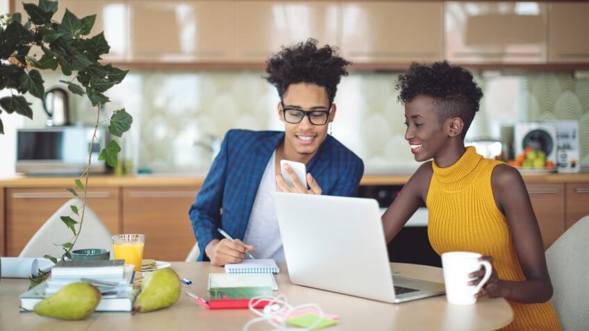 Young people working at home.
