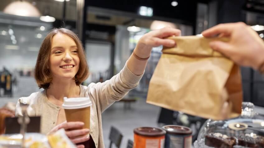woman purchasing pastries