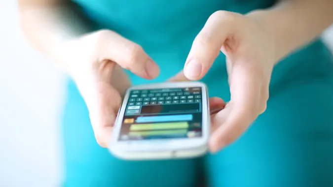 woman texting on a smartphone