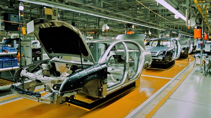 unfinished automobiles in a car plant