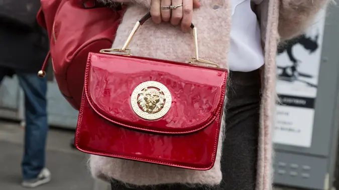 MILAN, ITALY - FEBRUARY 26: Detail of bag outside Emporio Armani fashion show during Milan Women's Fashion Week on FEBRUARY 26, 2016 in Milan.