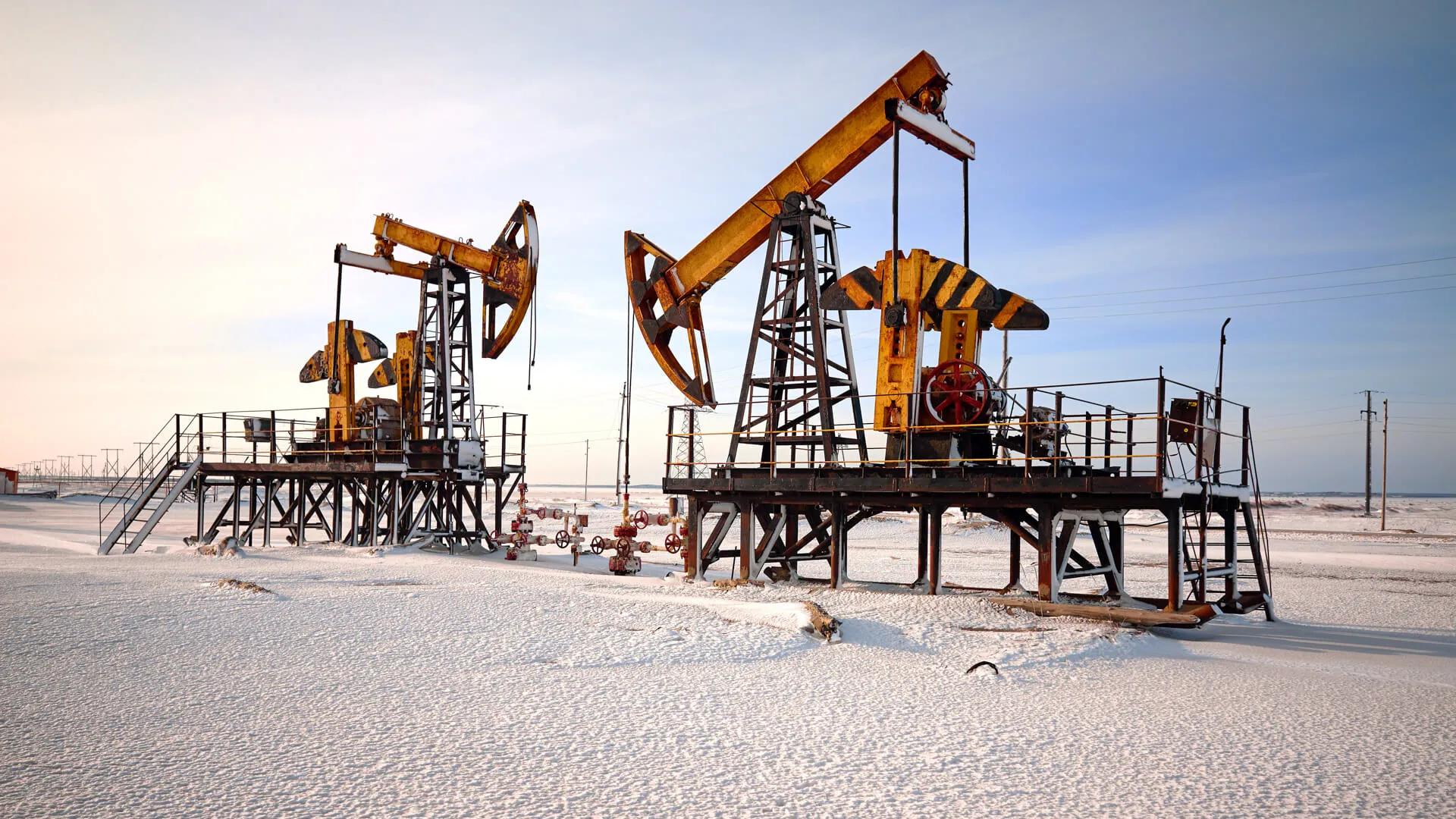 Oil pump cold winter and snow.
