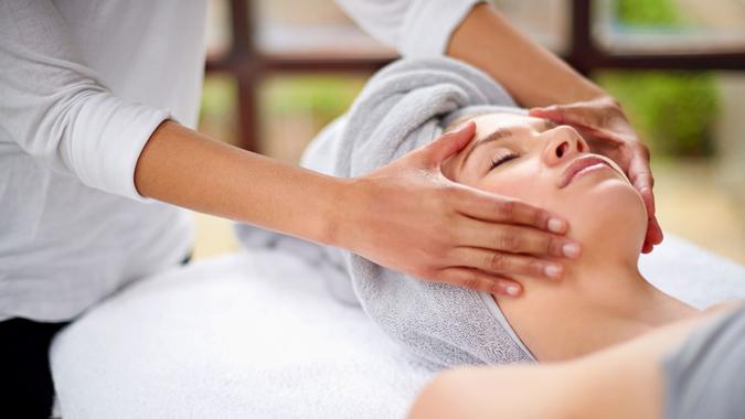 Cropped shot of a young woman enjyoing a massage at the day spahttp://195.