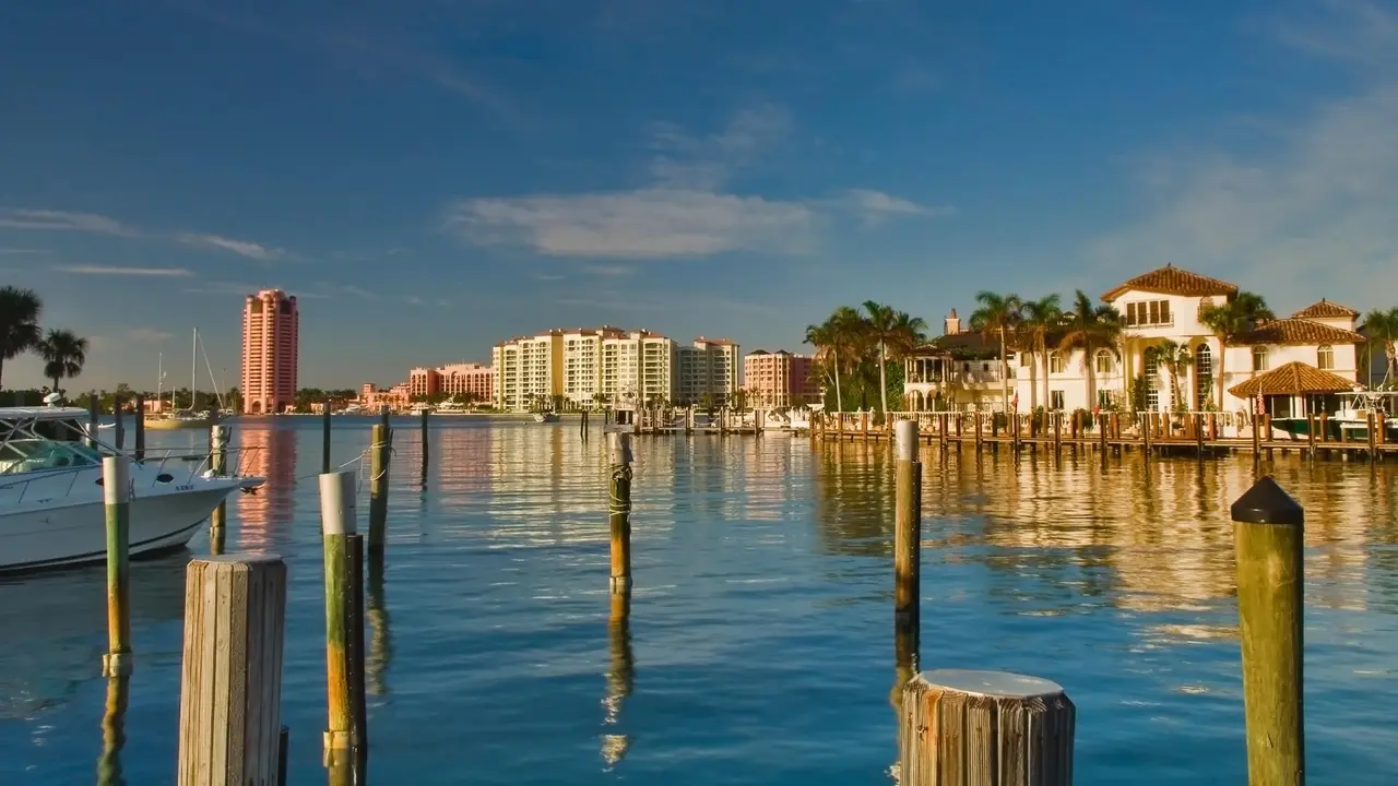 luxury waterfront development of homes, docks, condominiums and hotels in boca raton, florida.