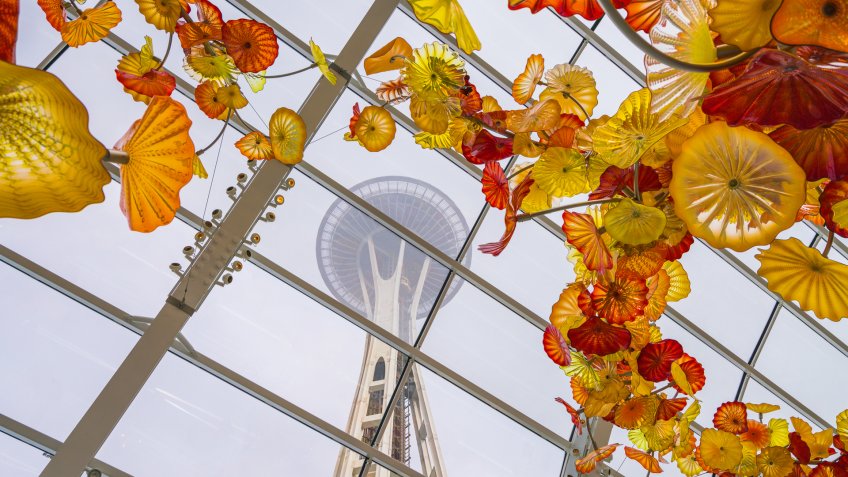 SEATTLE - Apr 26, 2016: Blown glass in abstract shapes in red and yellow, Chihuly Garden and Glass Museum, Seattle, Washington.