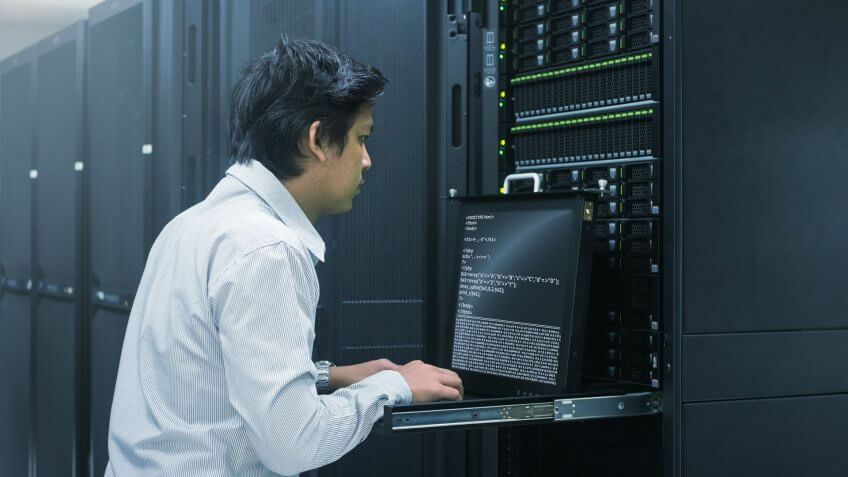 Administrator working in data center.