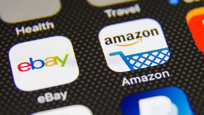 Phone screen with internet shopping e-commerce applications.