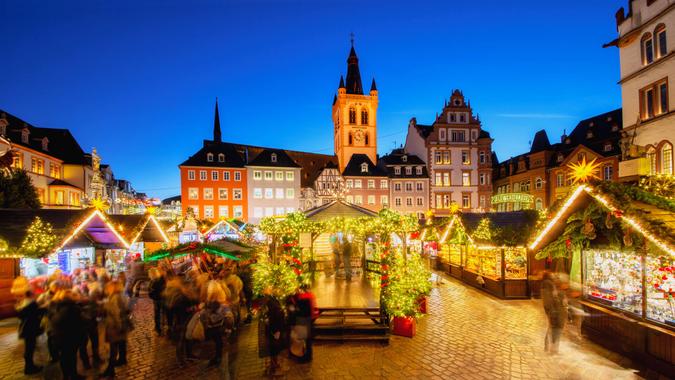 View over Trier´s main square and christmas market at dusk.