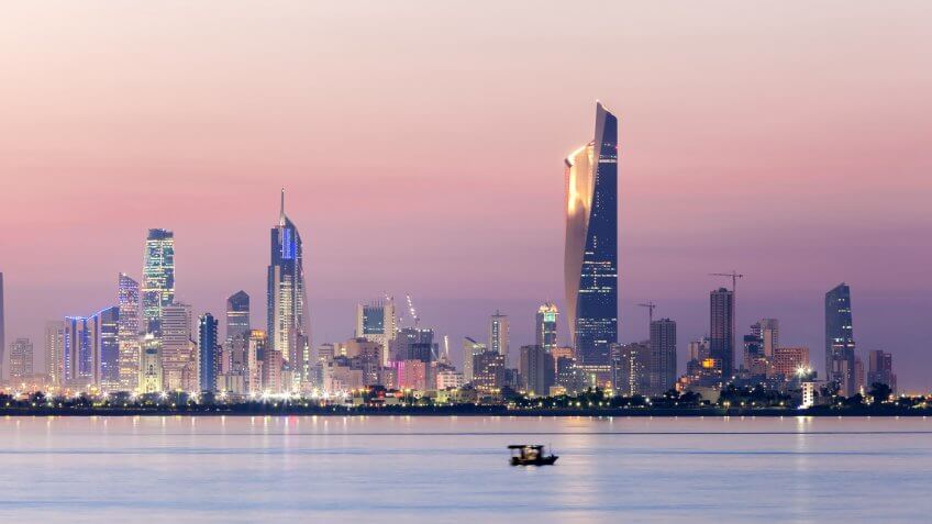 Skyline of Kuwait city at night.