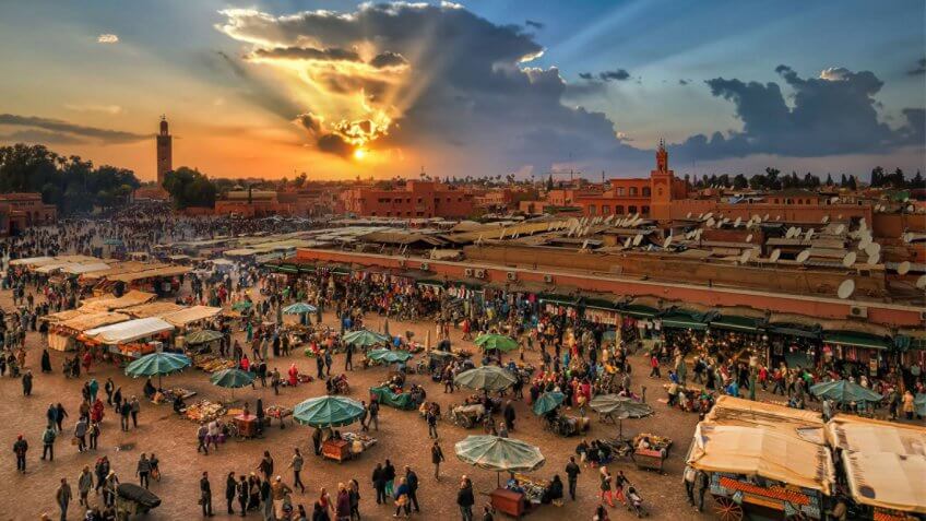 Bustling markets of Marrakech, Morocco at sunset