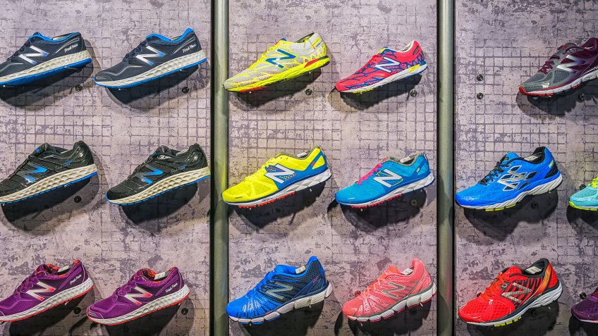 MADRID, SPAIN - SEPTEMBER 9: New Balance athletic shoes on a sports shop counter in Madrid on September 9 2015.