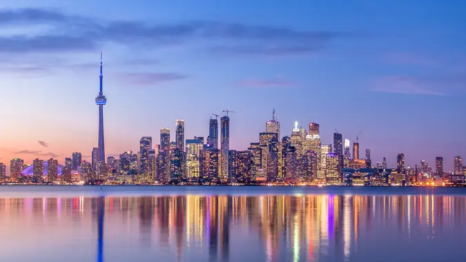 Toronto Skyline with purple light - Toronto, Ontario, Canada.