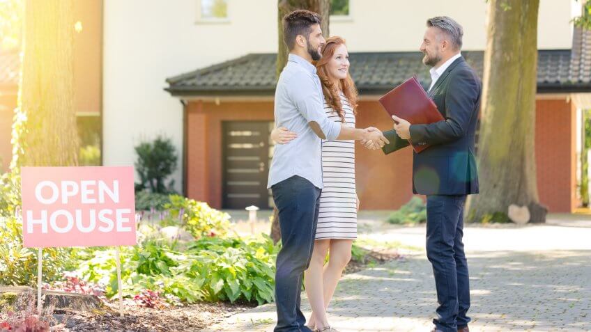 couple meeting with realtor
