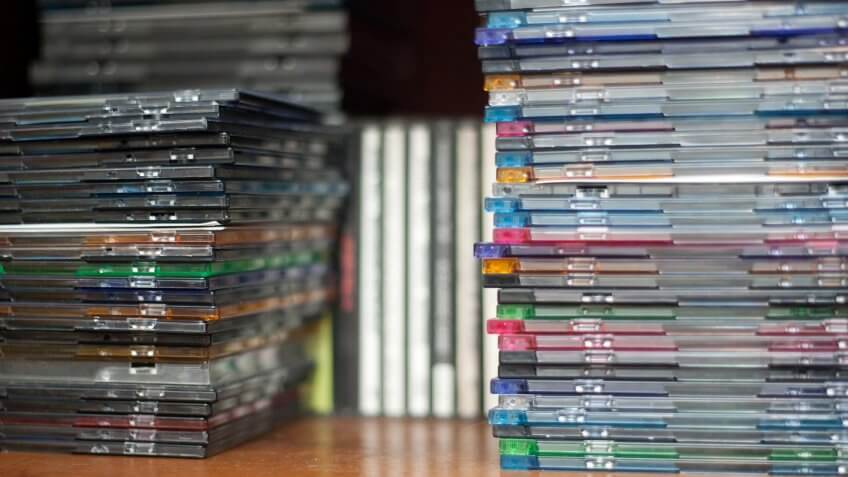 Rows of music cds on the shelf.