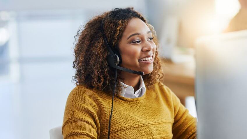 Shot of a female agent working in a call centre.