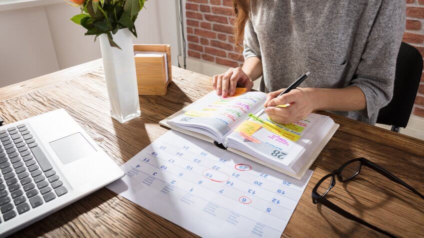 girl reviewing calendar
