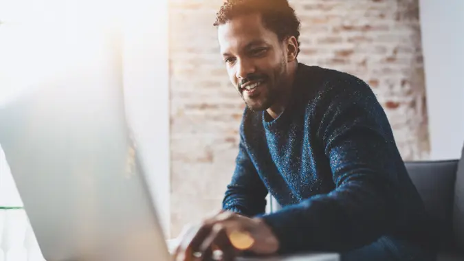 man working on laptop