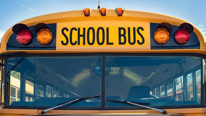 Front closeup view of a yellow school bus.