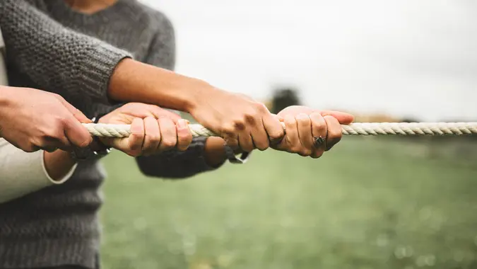 pulling the rope for teamwork.